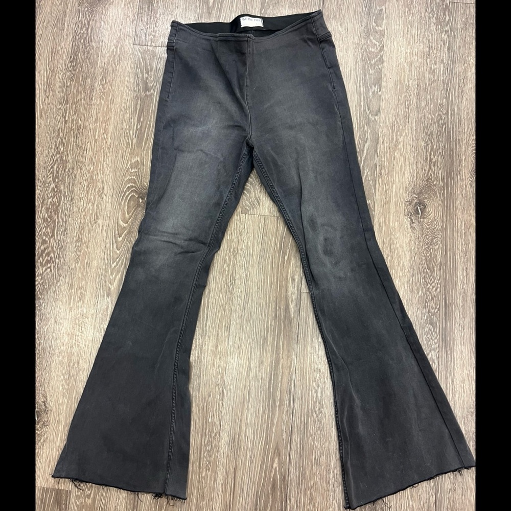 Free People black raw hem flares